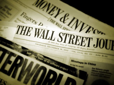 Between 20 and 40 Axed at Wall Street Journal