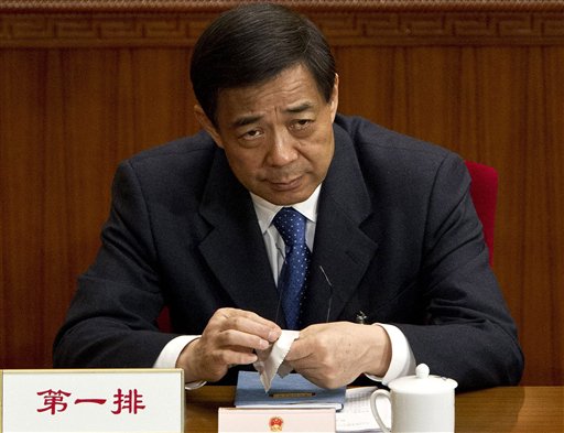 China mulls risky public trial for fallen politico
