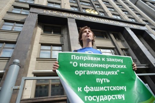 Putin Signs Law Branding NGOs 'Foreign Agents'