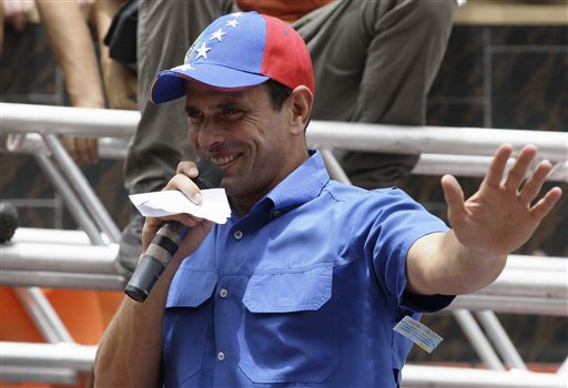 Chavez Presidential Challenger Stirs Dispute with Flag-Colored Cap