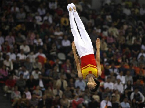 China's Dong Goes from Bronze to Gold