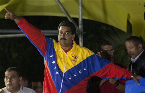 Chavez's Heir to Take over Divided Venezuela