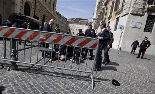 Protester Shoots Two Italian Policemen