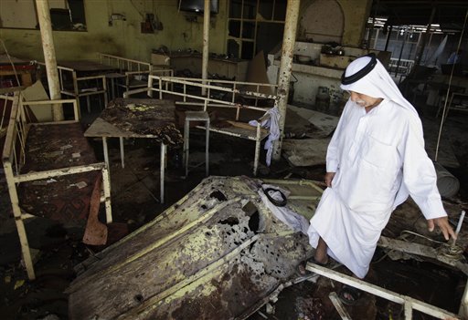 Officials: Car Bombs Kill 26 in Iraqi Capital