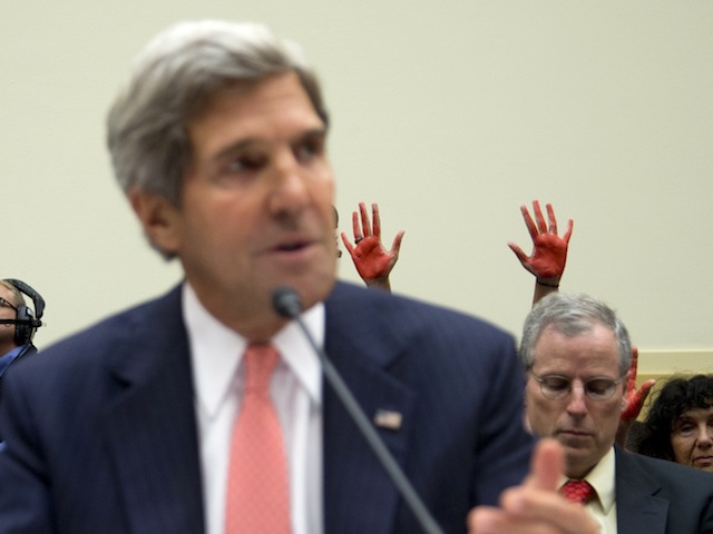 Code Pink Protesters Hold Faux-Bloody Hands Behind Kerry at House Syria Hearing