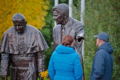 Arm Cut Off of Reagan Statue in Poland