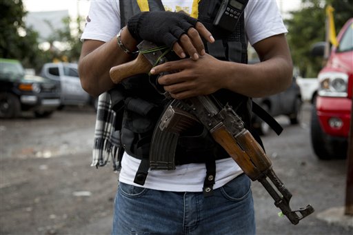 Mexico vigilantes agree to join government forces