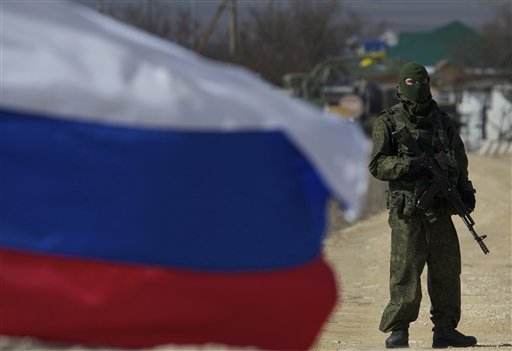 Putin: Troops to Bases; Warning Shots in Crimea