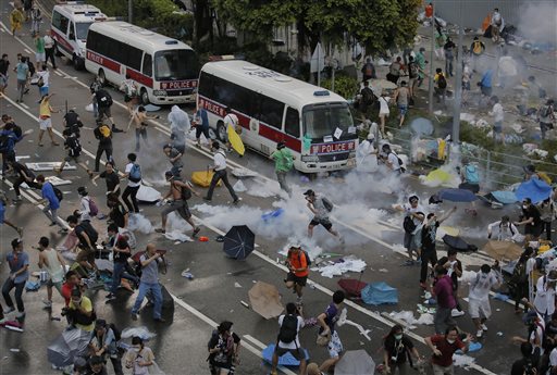 Violence Erupts as Tens of Thousands in Hong Kong Protest Beijing Restrictions