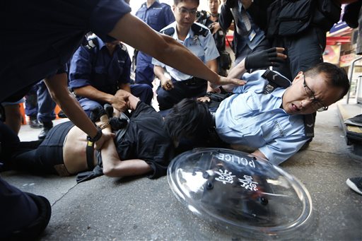 Hong Kong Riot Police Attack Peaceful Protest Zone in Dawn Raid
