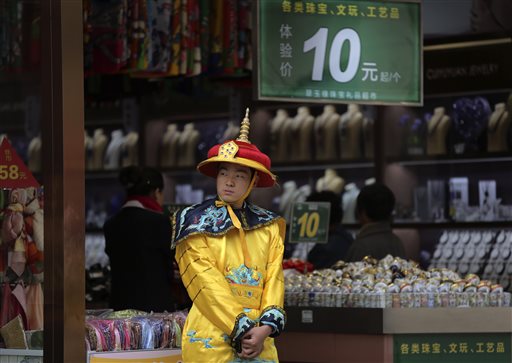 AP Survey: China Slowdown to Bruise Global Economy