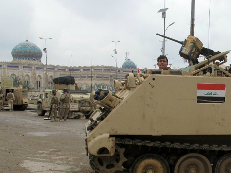 Britain airdrops humanitarian aid for besieged Iraqis