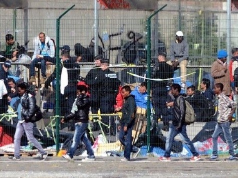 Calais Illegals Taunt Border Guards