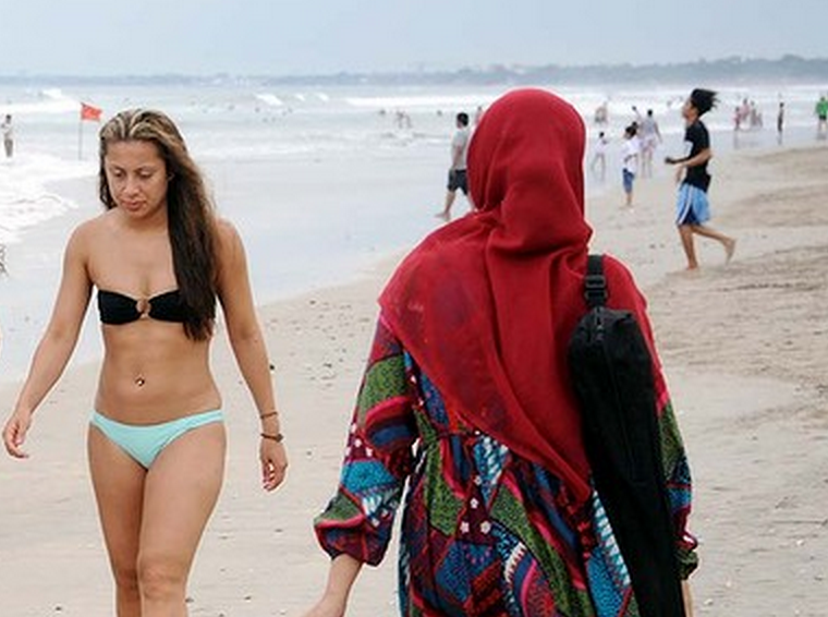 Wearing A Bikini is a French Woman's Duty Claims Anti-Hijab Minister