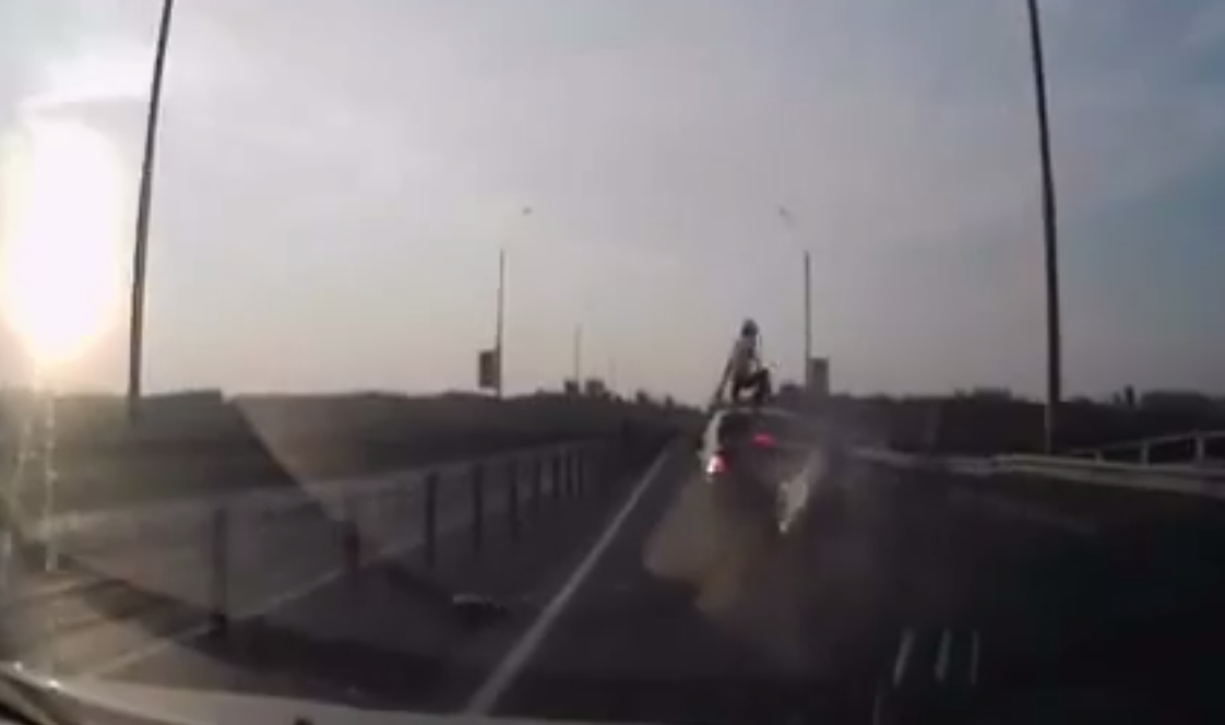 WATCH: 'Insane' Bike Flip Crash on Belarus Motorway