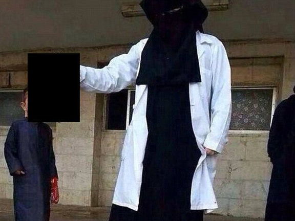 British Female Jihadist Medic Pictured Holding Severed Head