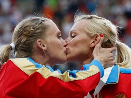 Russian Female Track Athletes Kiss on Podium