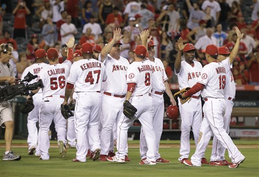 Angels Clinch Playoff Spot, Beat Mariners 8-1