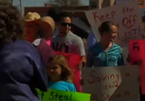 Protesters Greet President Obama In Roswell
