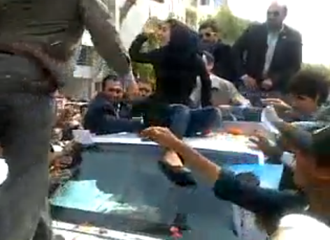 Iranians Rush Ahmadinejad's Car To Protest Poverty
