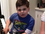 WATCH: Six-Year-Old Autistic Boy Plays 'Piano Man' Perfectly