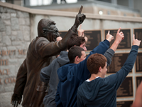 Paterno Fans Line Up To Take Picture With Coach's Statue