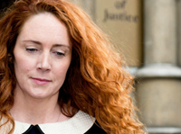 Eight Charged With Phone-Hacking In Britain