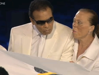 Muhammad Ali Accompanies Olympic Flag