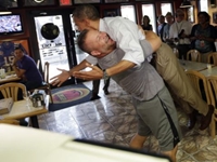WATCH: Excited Business Owner Lifts Obama