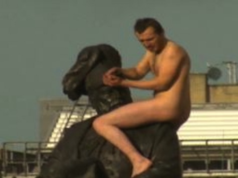 Naked Man Climbs London Statue