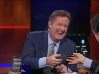 Colbert Mocks Shapiro; Hands Piers Morgan Two Constitutions in Comedy Interview
