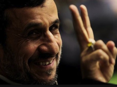 Creepy: Ahmadinejad Kisses Chavez's Coffin