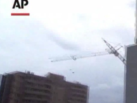 Watch: Crane Falls on Russian Apartment Building