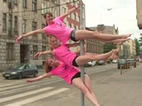 Polish Pole Dancers Show Moves on Street Corners