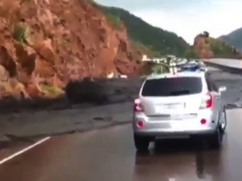 WATCH: Wall Of Mud Washes Car Away In CO