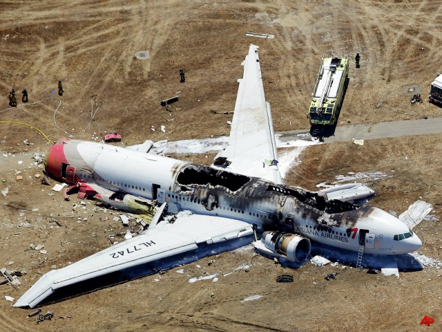 Couple Charged with Stealing Luggage After Asiana Plane Crash