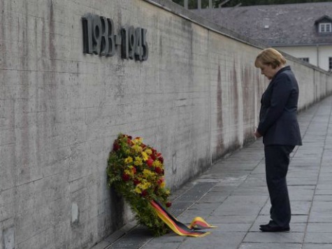 Germany's Merkel Stirs Controversy with Visit to Nazi Camp
