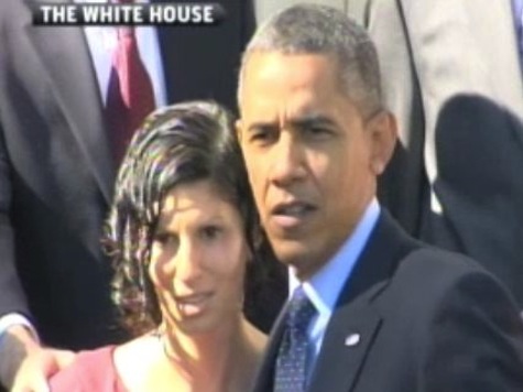 Woman Almost Passes Out Behind President Obama