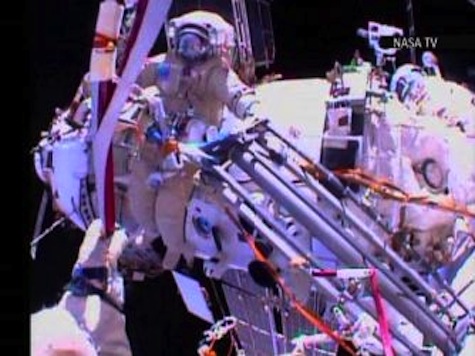 Cosmonauts Hand Off Olympic Torch in Space
