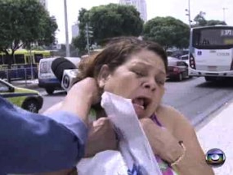 Raw: Rio Woman Robbed During TV Interview on Crime