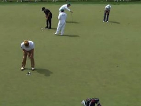 Miguel Angel Jimenez Stretches, Practices Before Round with Cigar