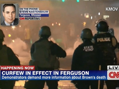 Police Unleash Smoke Bombs as Curfew Begins in Ferguson