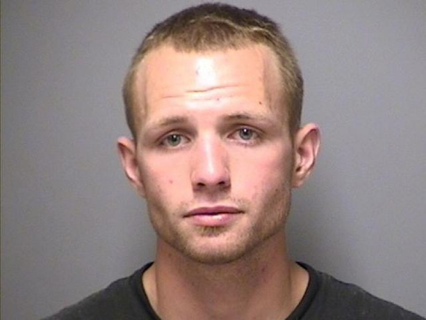 Cops: Man Arrested Driving By Police Station While Snorting Drugs