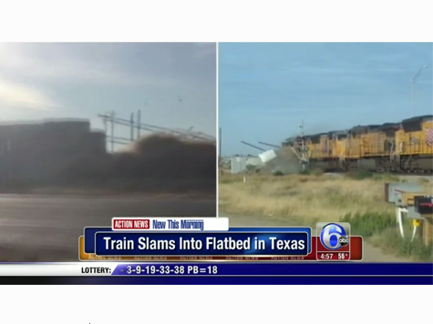 VIDEO: Train Cuts 18-Wheeler in Half
