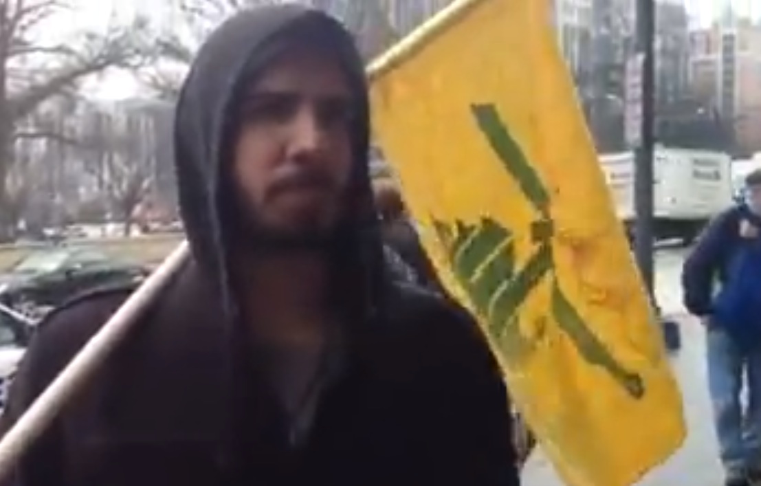 (VIDEO) Demonstrators Wave Terror Group Hezbollah Flags Outside AIPAC Conference