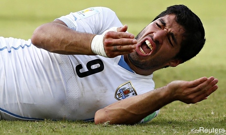 WORLD CUP: Ban 'biter' Suarez, says British press
